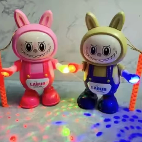 JUGUETE BAILARÍN CON LUCES Y MÚSICA. PILAS INCLUÍDAS